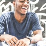 Laughing Man Wearing Gray V-neck T-shirt